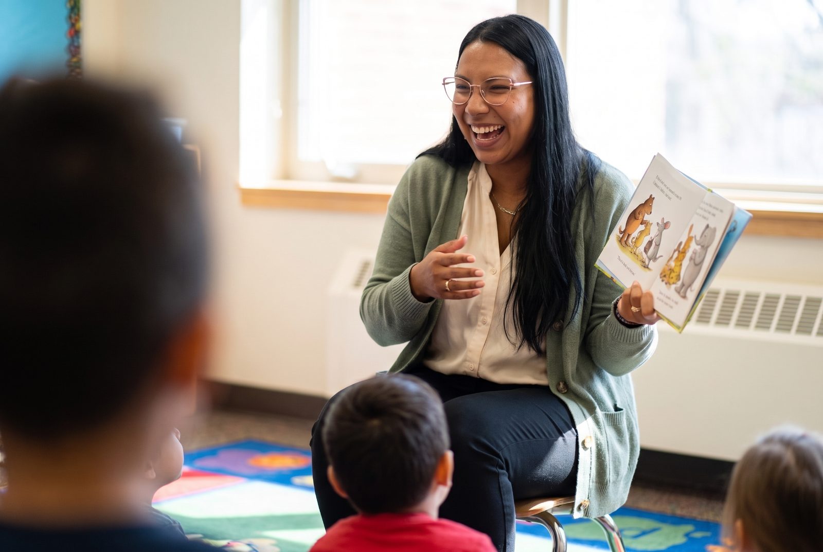 Janessa reading aloud with her class